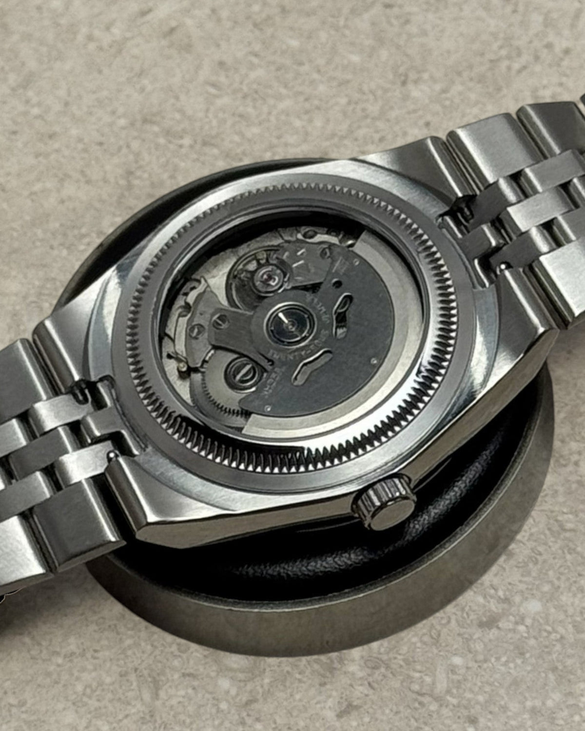 PB TimePiece Honeycomb watch showing the automatic Seiko NH35 movement through the stainless steel exhibition caseback