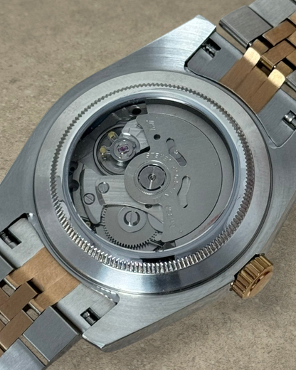 PB TimePiece Classic Date watch showing the automatic Seiko NH35 movement through the exhibition case back