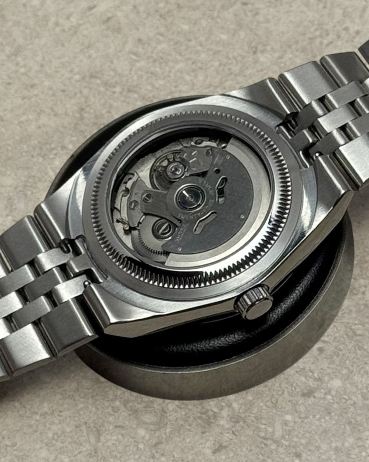 PB TimePiece Honeycomb watch showing the automatic Seiko NH35 movement through the stainless steel exhibition case
