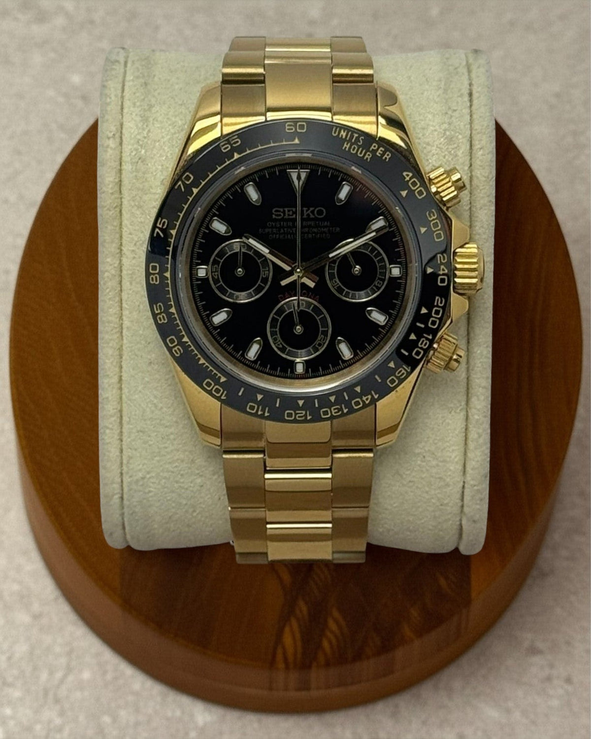 PB TimePiece Bumblebee chronograph watch featuring a 39mm gold case, black dial, and polished gold oyster bracelet.