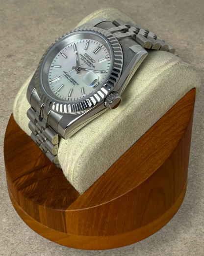 PB TimePiece Classic Date watch with mother of pearl dial, fluted bezel, and stainless steel jubilee bracelet.