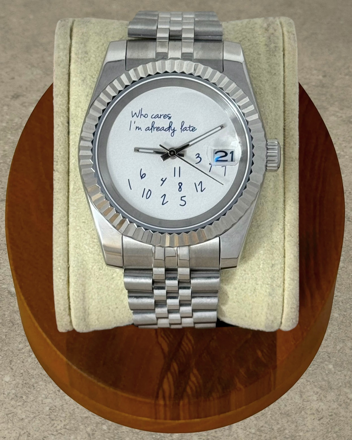 PB TimePiece Classic Date watch with stainless steel jubilee bracelet, fluted bezel, and whimsical late dial design.