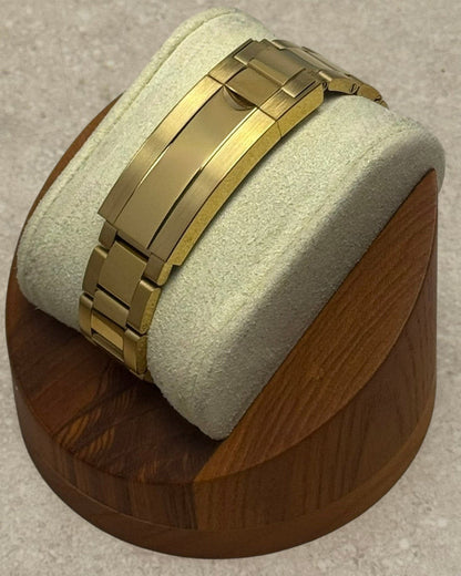 PB TimePiece Bumblebee chronograph watch featuring a polished gold oyster bracelet with a microadjusting gold clasp.