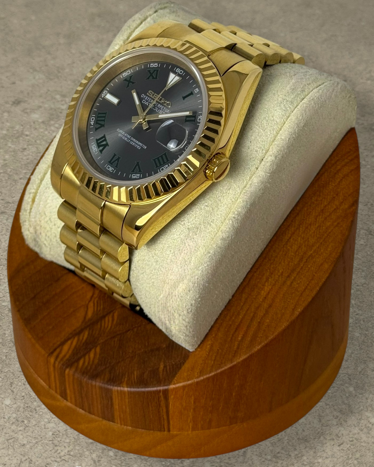 PB TimePiece Classic Date gold watch with Wimbledon dial, fluted bezel, and stainless steel presidential bracelet.