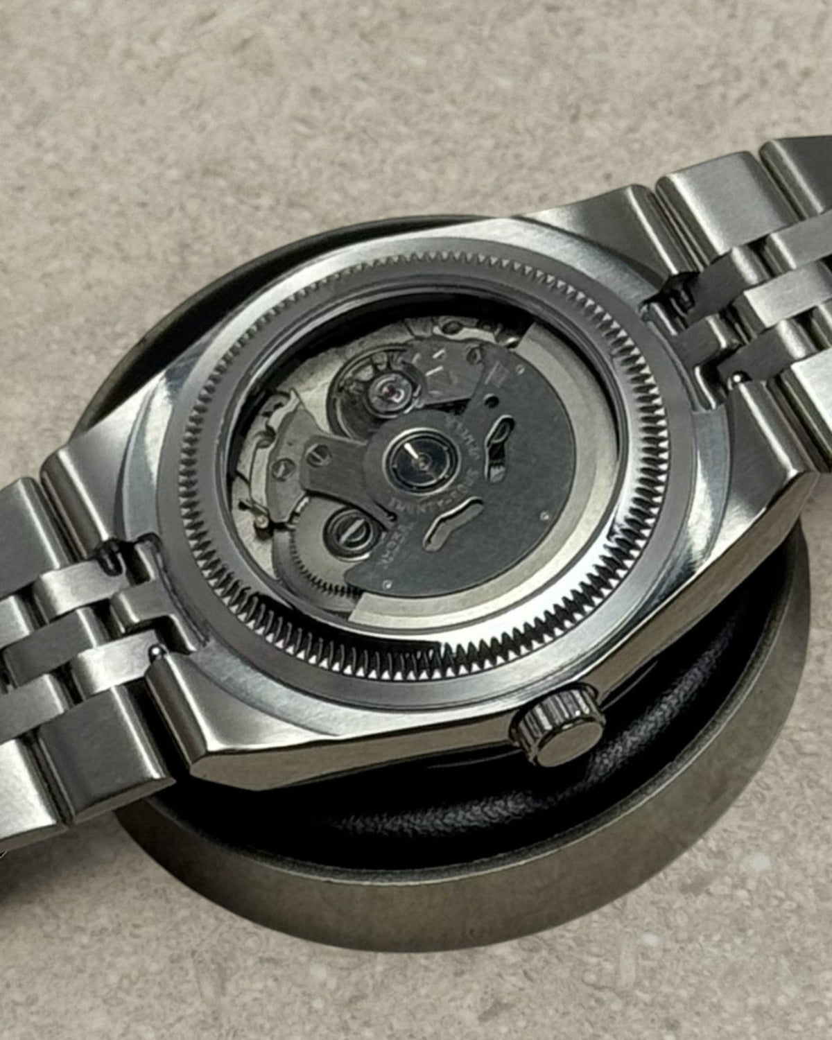 PB TimePiece Honeycomb watch showing the automatic Seiko NH35 movement through the stainless steel exhibition case