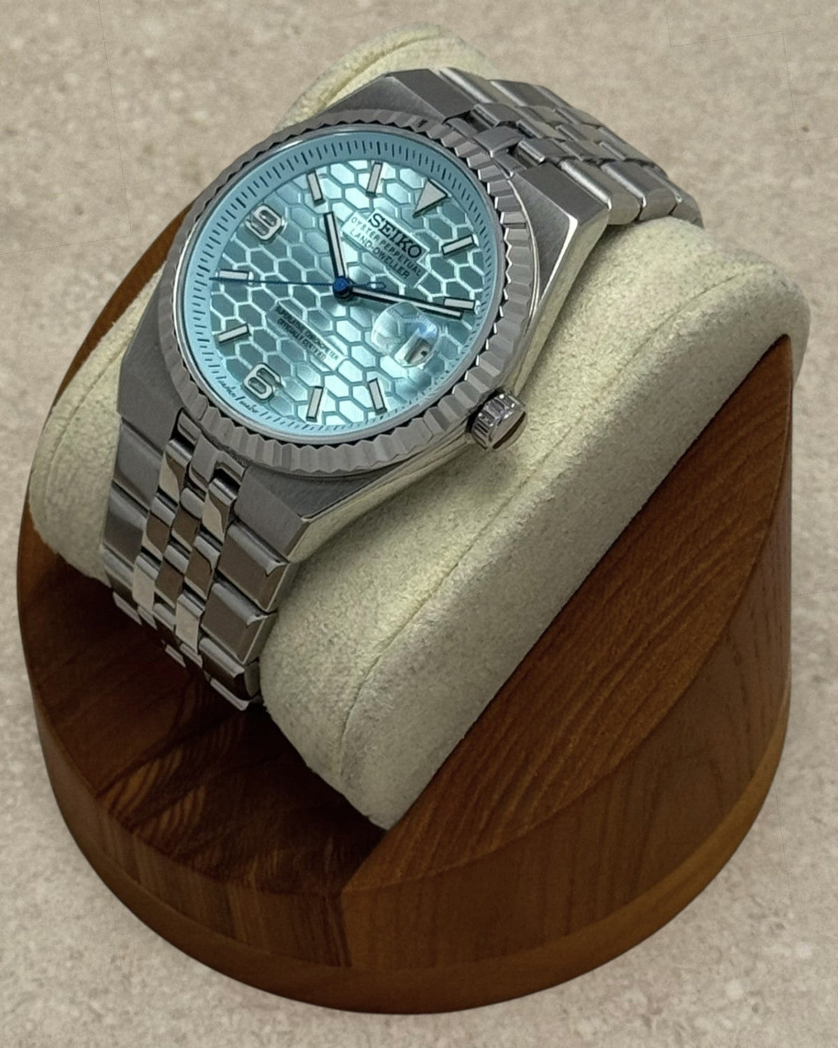 PB TimePiece Honeycomb watch with a mint textured dial, stainless steel jubilee bracelet, and fluted bezel.