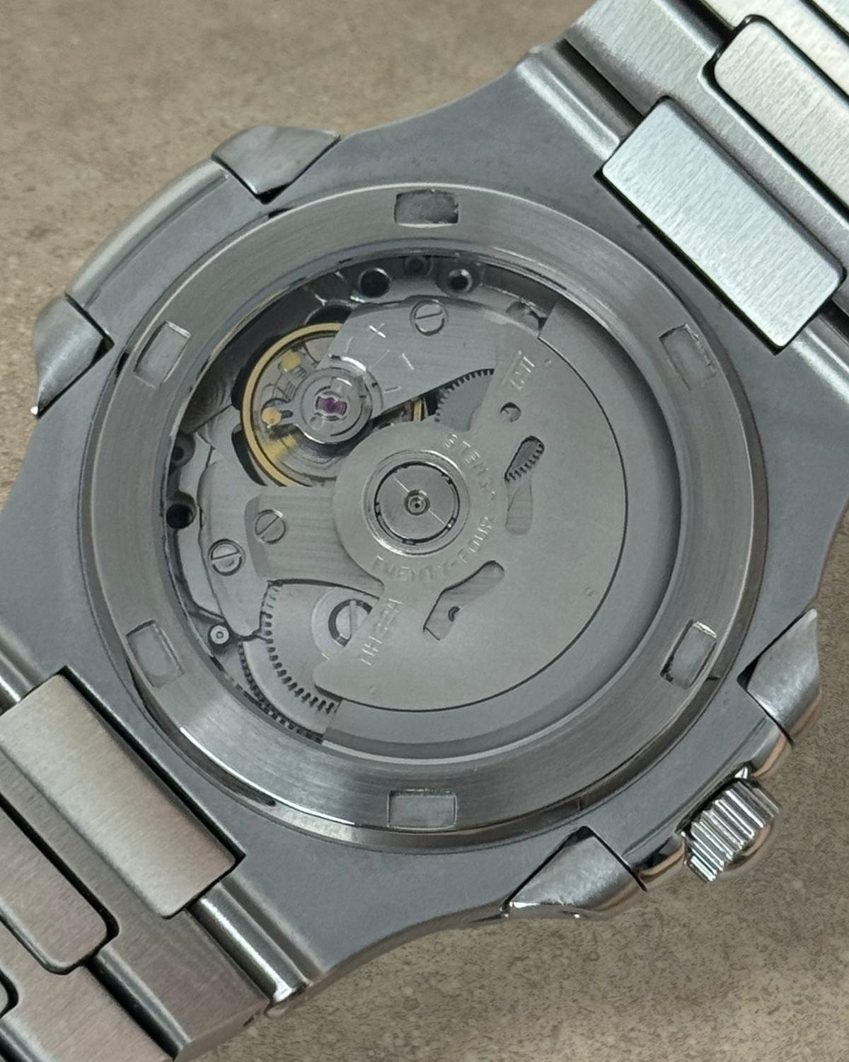 PB TimePiece Novara watch showing the automatic Seiko NH70 movement through the stainless steel exhibition case back