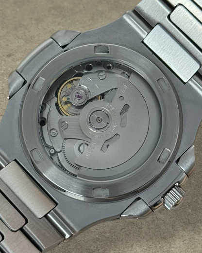 PB TimePiece Novara watch showing the automatic Seiko NH70 movement through the stainless steel exhibition case back