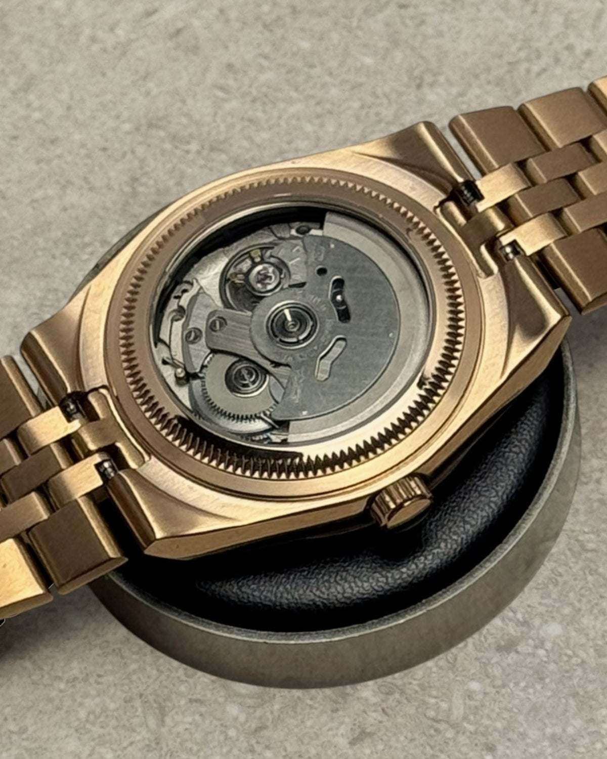 PB TimePiece Honeycomb watch showing the rose gold case back and exhibition window for the Seiko NH35 movement.