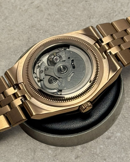 PB TimePiece Honeycomb watch showing the rose gold case back and exhibition window for the Seiko NH35 movement.