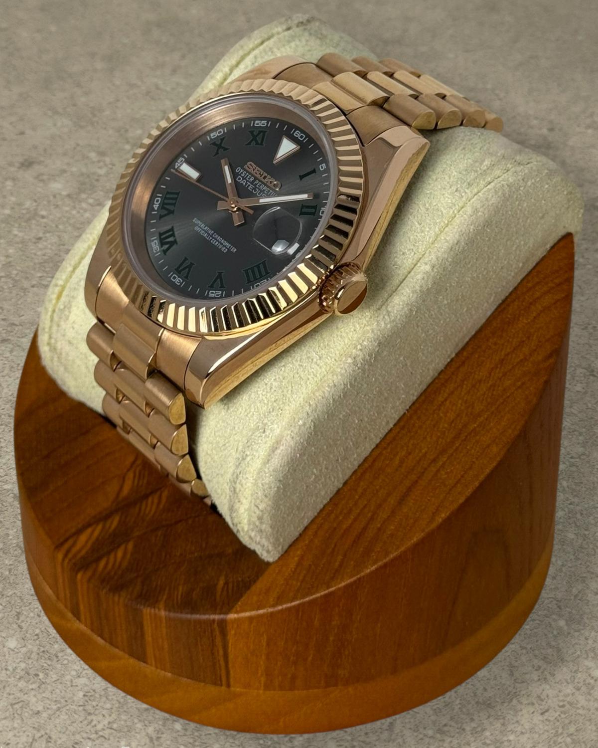PB TimePiece Classic Date watch in rose gold with a fluted bezel, presidential bracelet, and Wimbledon dial.