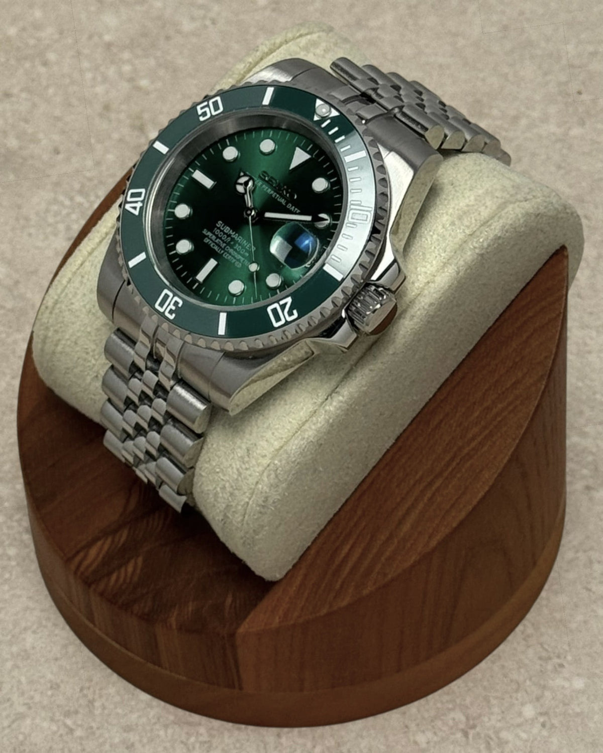 PB TimePiece Submariner Hulk watch with emerald green dial, rotating green bezel, and stainless steel jubilee bracelet
