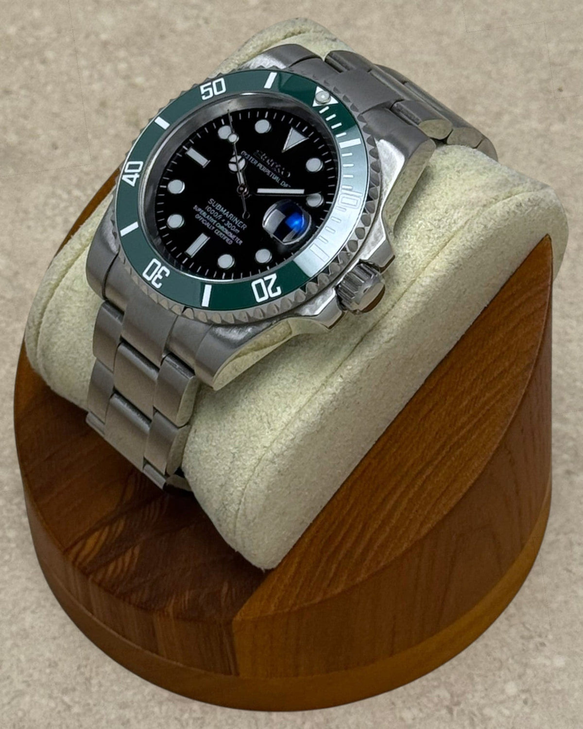 PB TimePiece Submariner Starbucks watch with a 40mm stainless steel case, green rotating bezel, and black dial.