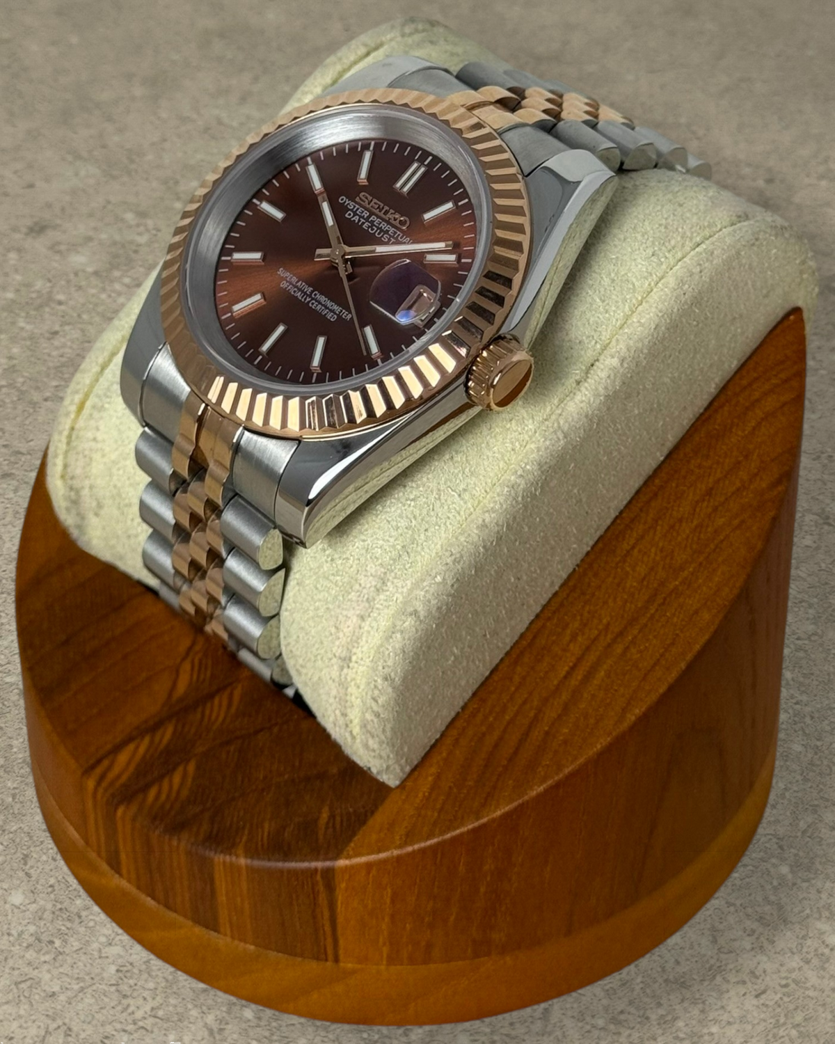 PB TimePiece Classic Date watch with a chocolate dial, fluted bezel, and two-tone rose gold jubilee bracelet.